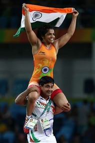 RIO DE JANEIRO, BRAZIL - AUGUST 17:  Sakshi Malik of India celebrates after defeating Aisuluu Tynybekova of Kyrgyzstan during the Women's Freestyle 58 kg Bronze match on Day 12 of the Rio 2016 Olympic Games at Caioca Arena 2 on August 17, 2016 in Rio de Janeiro, Brazil.  (Photo by Lars Baron/Getty Images)